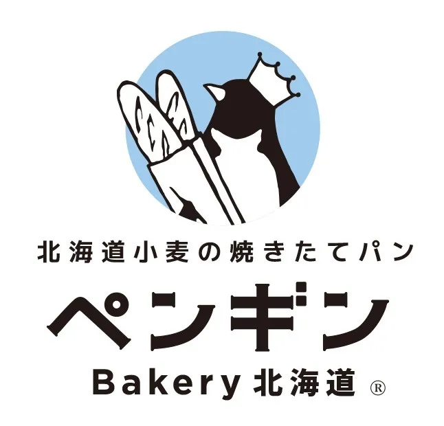 ペンギンのキャラクターが描かれたパン屋さんのロゴ